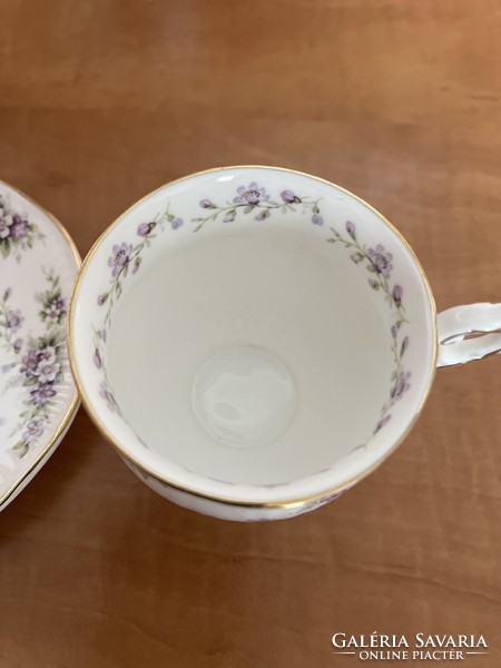 A dreamy English Elizabethan teacup with small saucer.