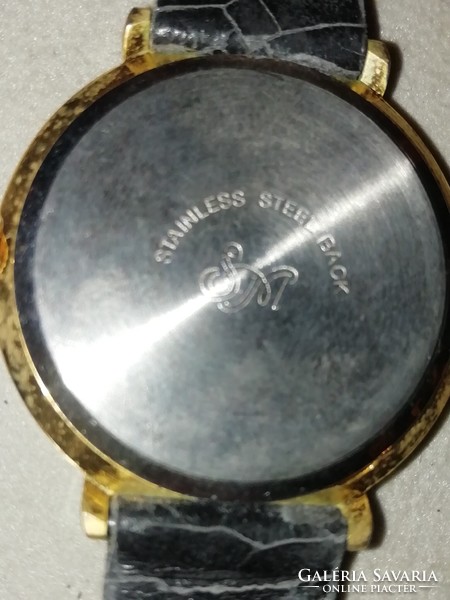 Watch 2. It is in the condition shown in the pictures