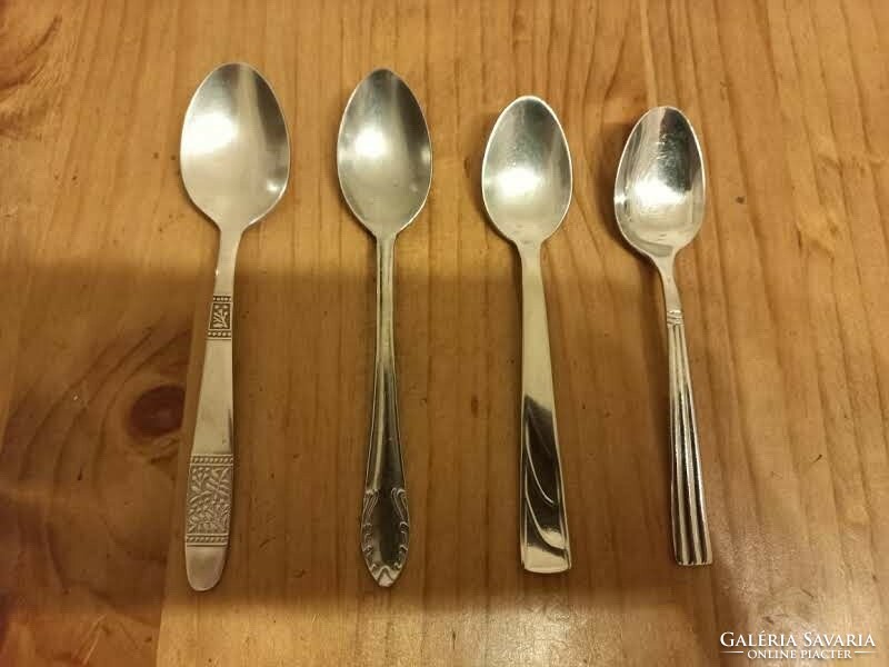 4 different stainless steel teaspoons