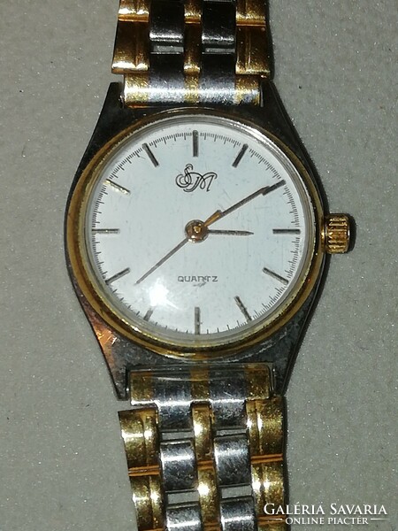 Women's watch is in the condition shown in the pictures