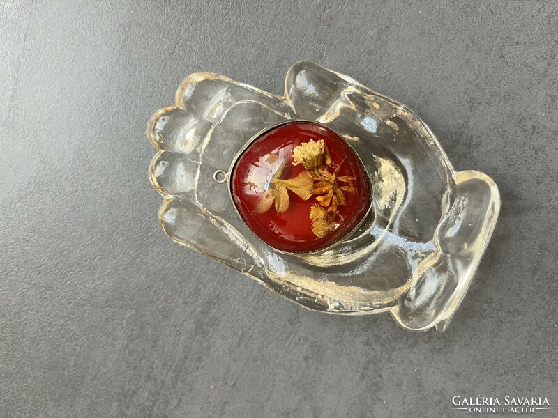Old cast burgundy pendant with slotted flowers