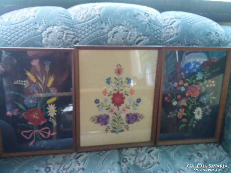 Antique embroidered wall pictures.