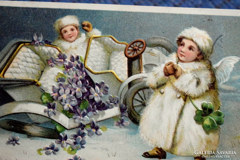 Antique embossed New Year greeting litho postcard - overturned automobile 4-leaf clover angel