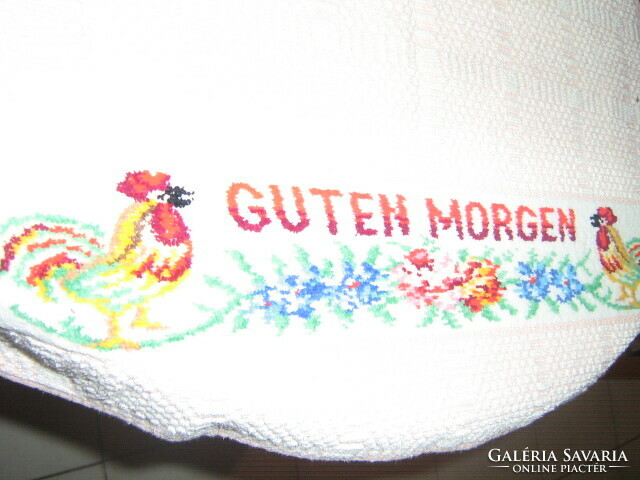 Charming pink towel with rooster and flower pattern