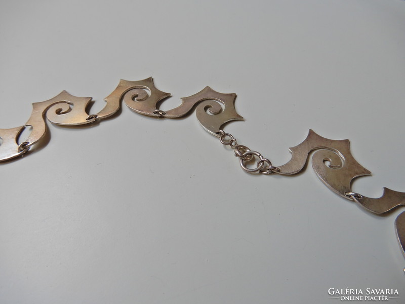 Old silver necklace with special pattern
