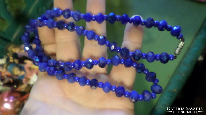 54 Cm necklace made of dark blue crystal beads.