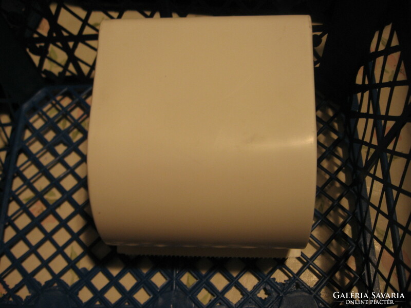 Retro white plastic toilet paper holder