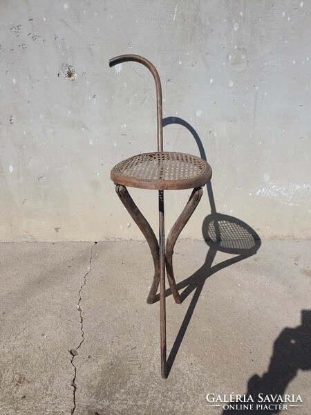 A very rare Viennese Thonet walking stick + seat is also an iconic collector's item!!!