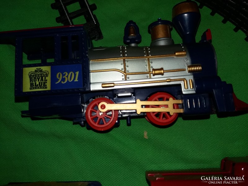 Retro American western toy train with steam wagons with circular track works with the box as shown in the pictures
