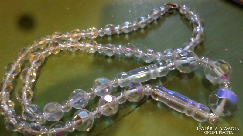 52 Cm, aurora brealis colored, necklace made of glass beads of mixed shapes.