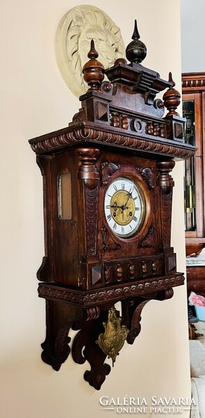 Antique half-baked wall clock from around 1880