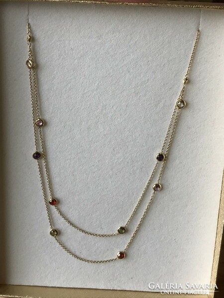 Yellow gold necklaces with colored stones
