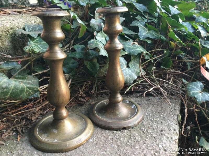 An old pair of smaller shaped candle holders