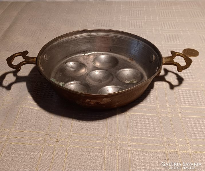Red copper baking dish with tinned interior