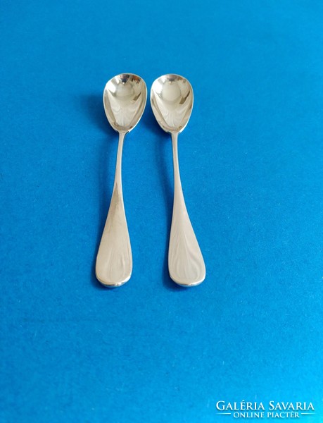 2 silver egg-eating spoons