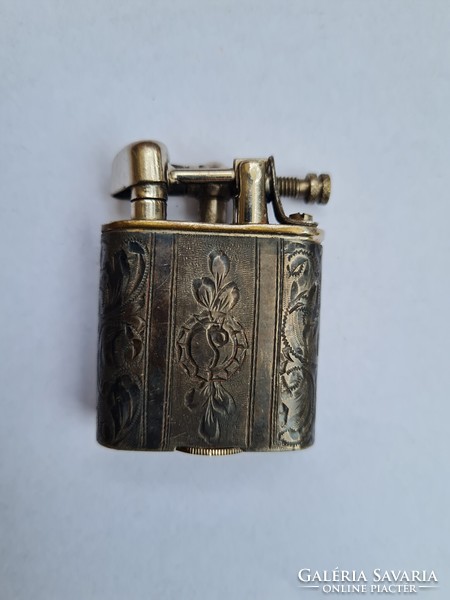Antique silver petrol lighter