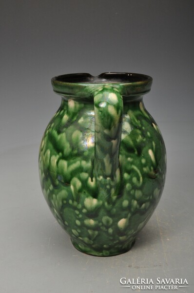 A very nice bell jug with brushed speckling.