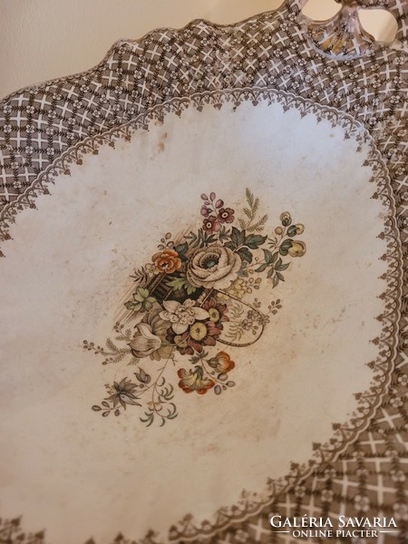 Antique French porcelain table in the middle, offering