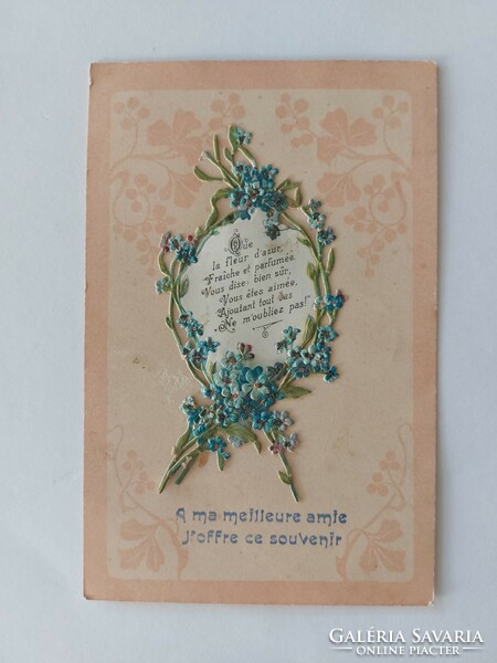 Old embossed postcard with forget-me-not