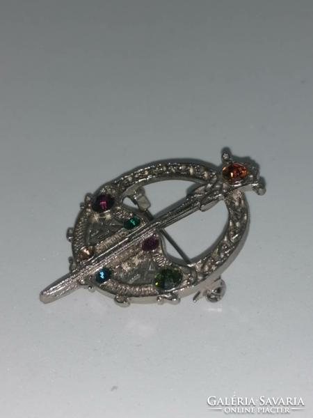 New silver-plated Celtic motif brooch embellished with multi-colored stones