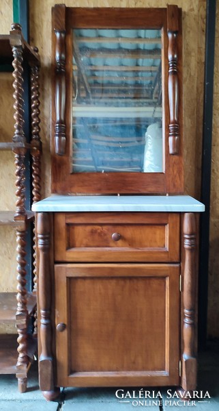 Chest of drawers with carved mirror