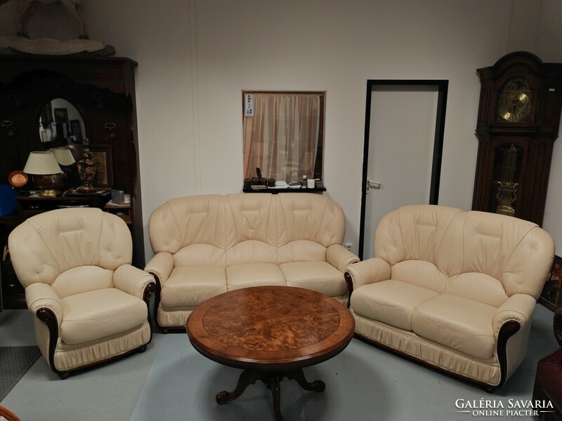 Italian butter colored leather sofa set in absolutely new condition.