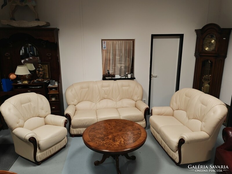 Italian butter colored leather sofa set in absolutely new condition.