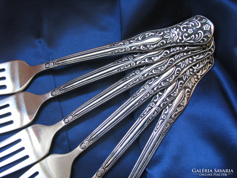 Set of antique Russian cutlery with a lotus flower pattern