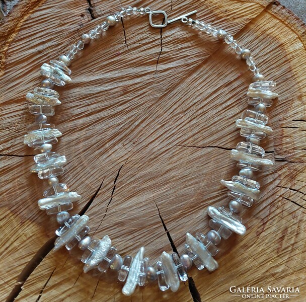 A wonderful necklace with genuine cultured (keshi) pearls and rock crystal stones with silver fittings
