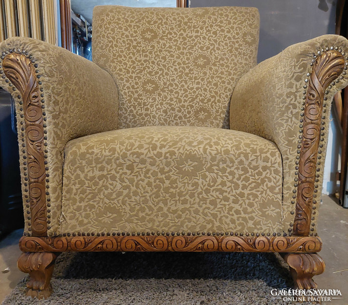 Special, huge club armchairs with lion legs.