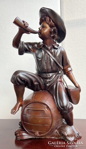Horn-blowing boy - bronze statue