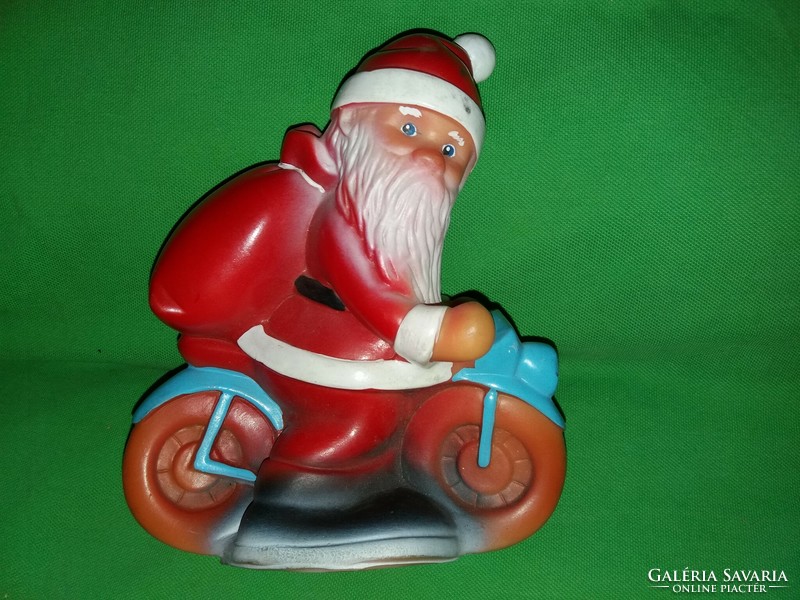 Antique Aradienca large Santa Claus on a bicycle rubber figure in good condition 19 cm according to pictures