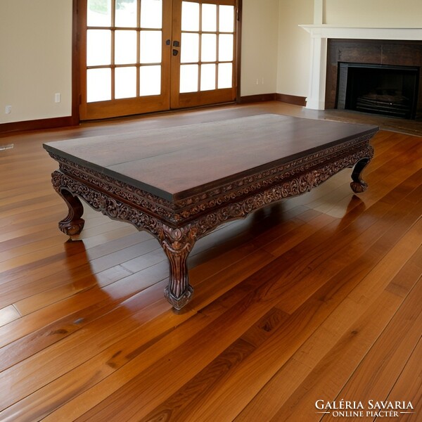 A wonderfully carved rectangular extra large tea table