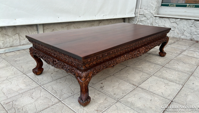 A wonderfully carved rectangular extra large tea table