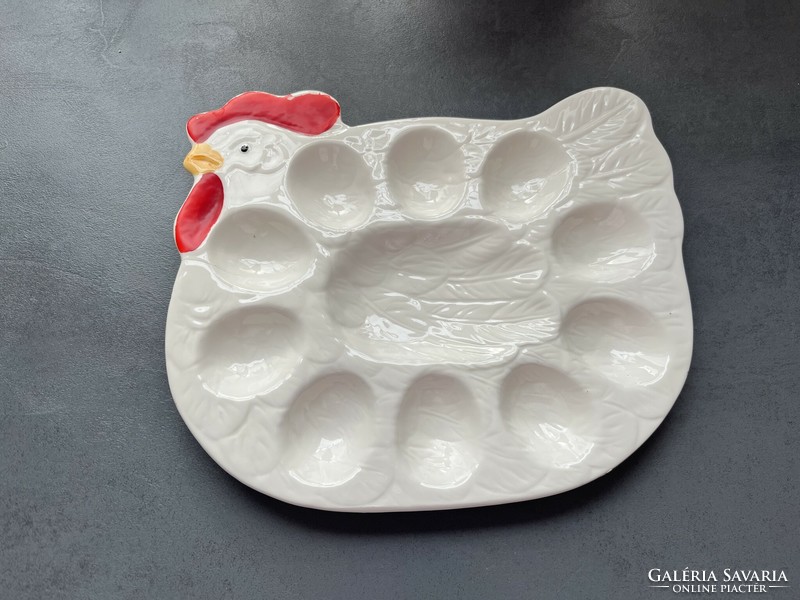 Ceramic bowl in the shape of a hen offering eggs