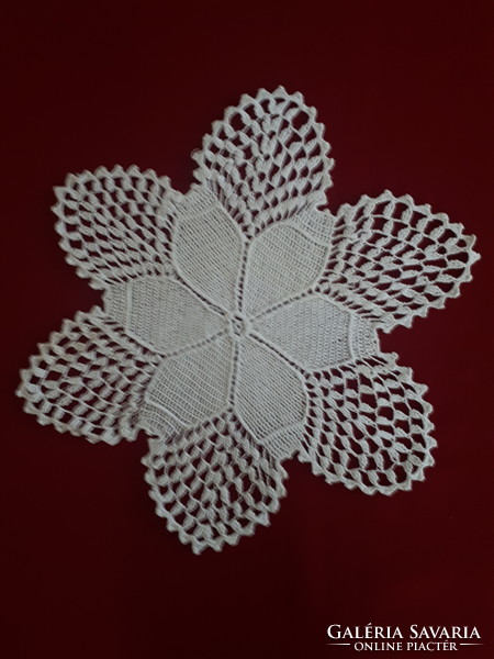 Crochet lace tablecloth in the shape of a flower