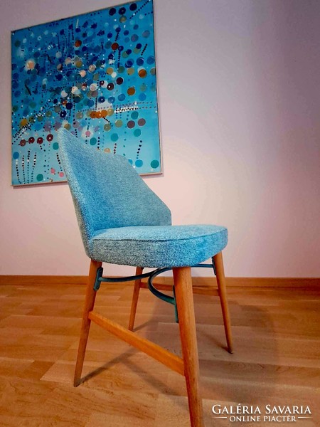 Unique, upholstered chair from the middle of the last century