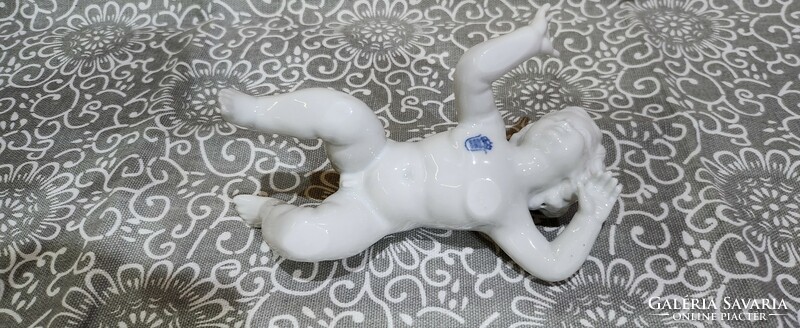 Unterweisbach porcelain boy lying down
