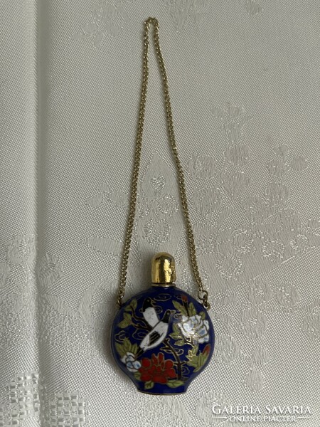 Beautiful compartment enamel perfume bottle with birds and flowers.