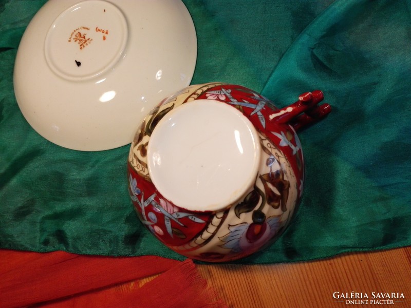 Old, hand-painted porcelain tea cup.....Oriental.