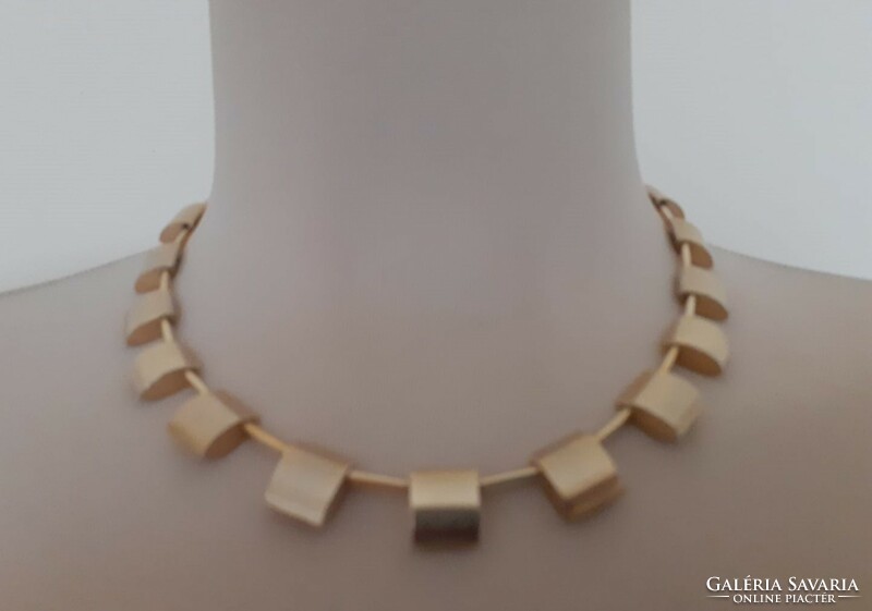 Showy, gold colored collars