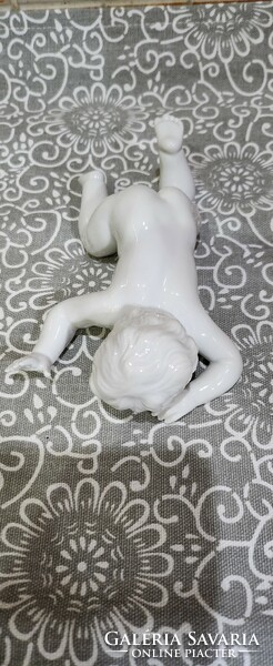 Unterweisbach porcelain boy lying down