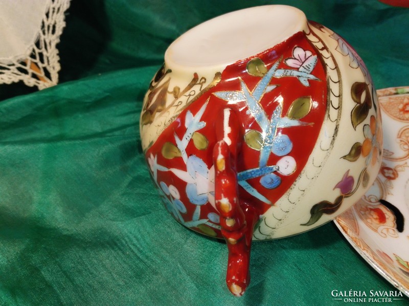 Old, hand-painted porcelain tea cup.....Oriental.