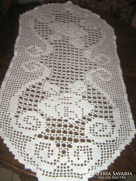 Beautiful white antique hand-crocheted rose tablecloth
