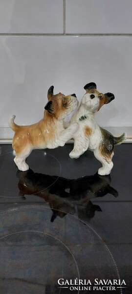 Pair of Ens German porcelain playing dogs