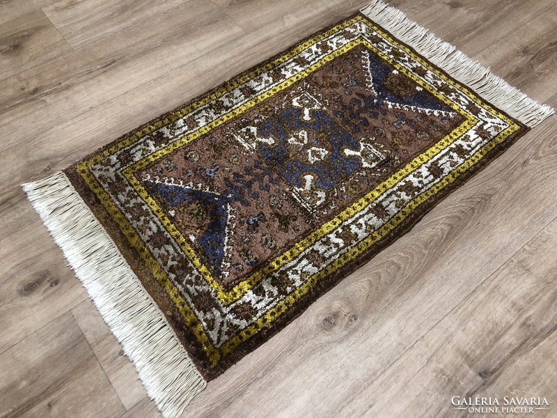Hand-knotted cotton-silk Persian rug, 53 x 101 cm