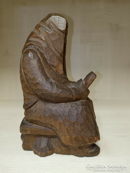 Reading man made of wood