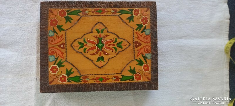 Painted and carved wooden box
