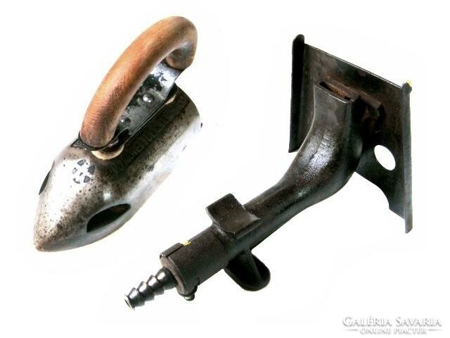 Antique gas iron with heating nozzle, from the early 1900s.