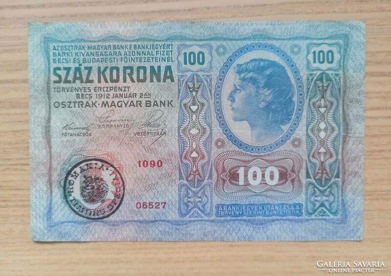 100 Korona 1912 with Romanian overprint. Two folds, donkey ears.